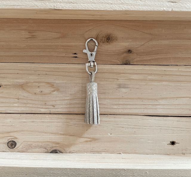 Pompon beige avec motif