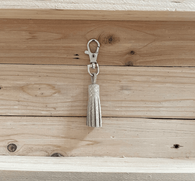 Pompon beige avec motif